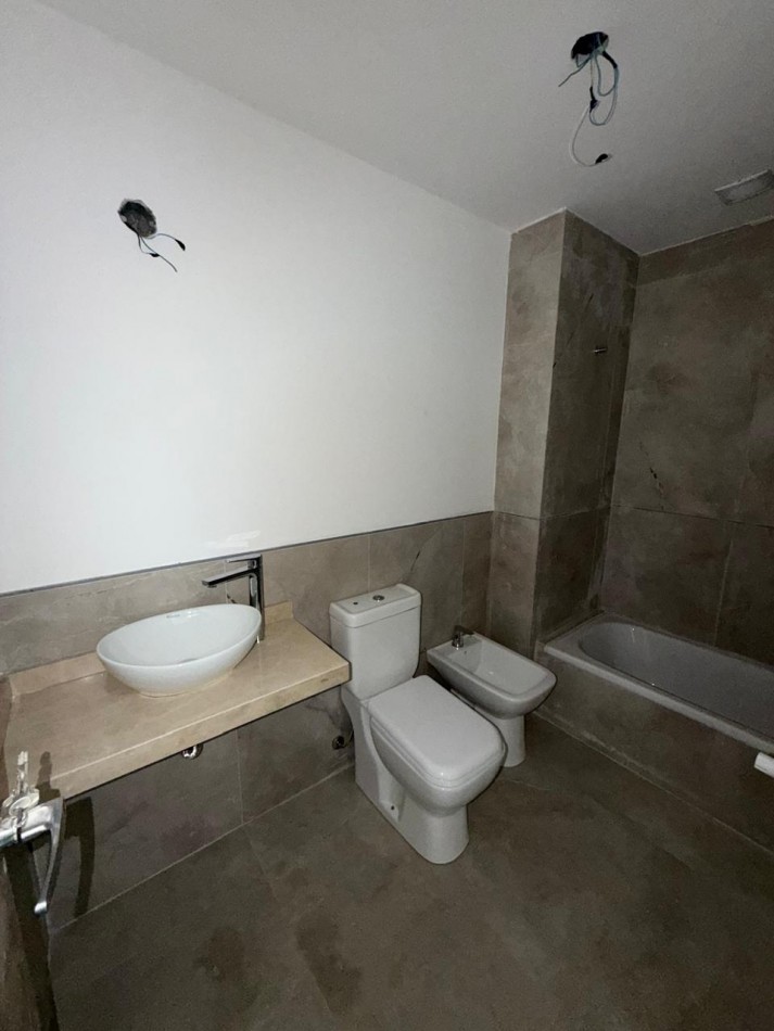 Excelente departamento 4 ambientes con cochera a estrenar 