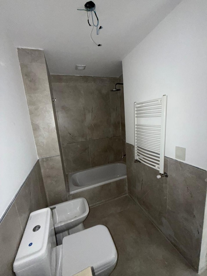 Excelente departamento 4 ambientes con cochera a estrenar 